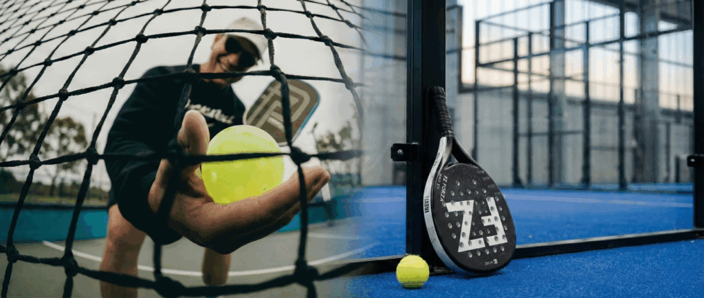 pickleball player holding yellow ball and paddle behind net on outdoor court alongside FORZA Z3 padel racket leaning on blue court with glass walls visible
