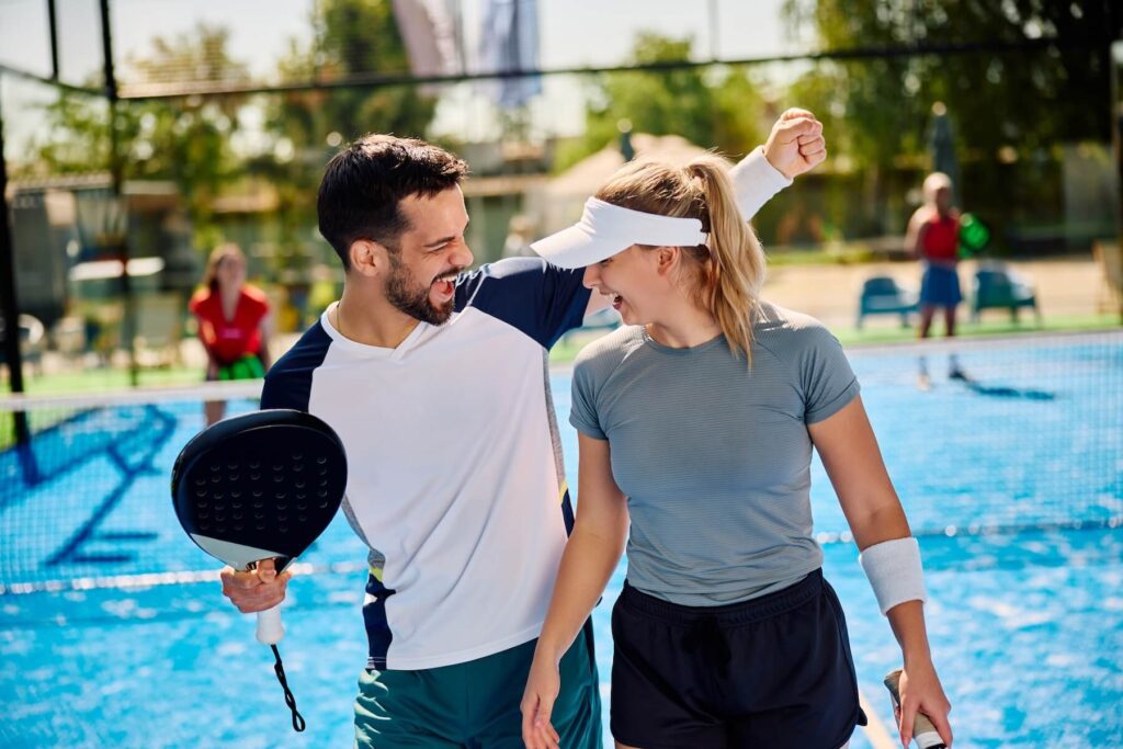 A couple on a date having a great time at padel den in orem